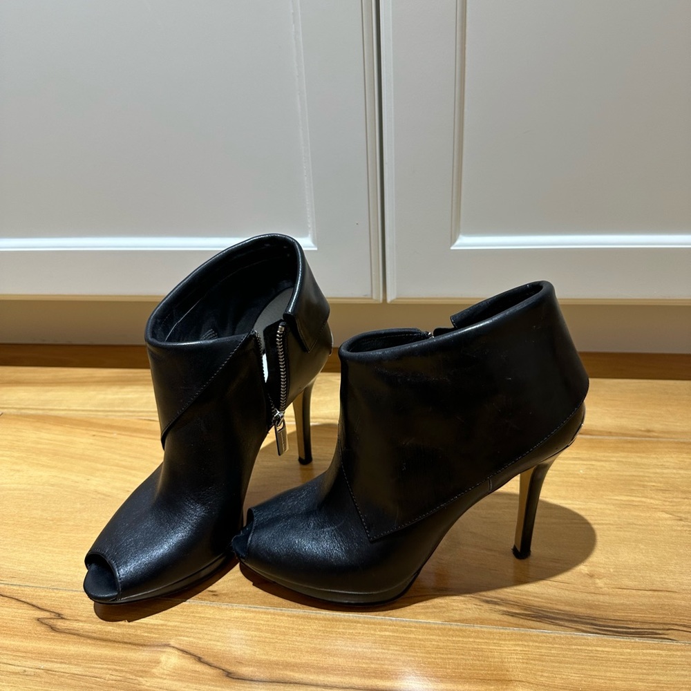 Black Michael Kors, leather heels, size 7
